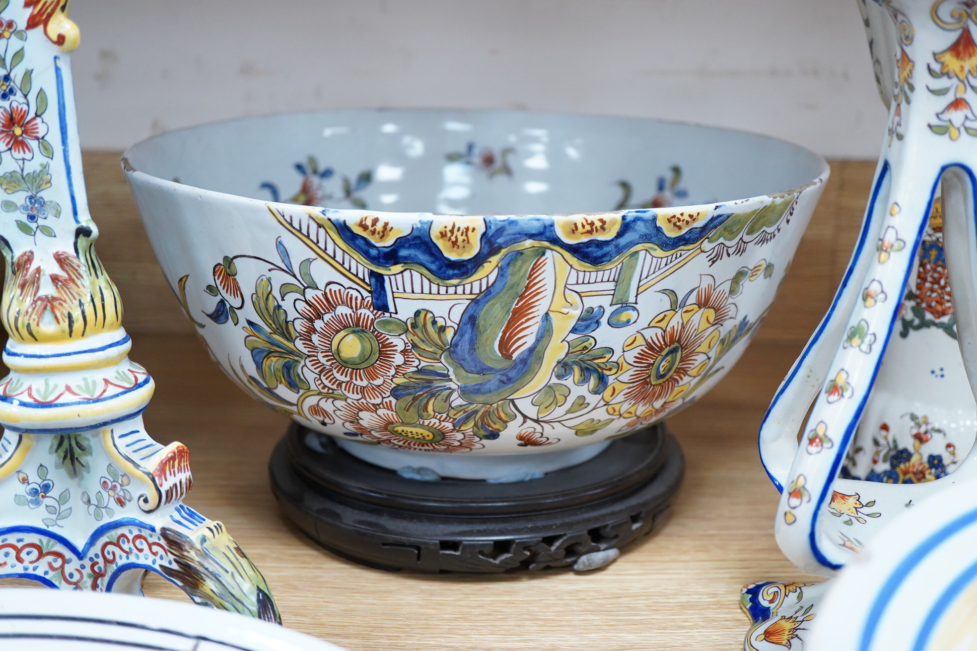 18th and 19th century faience including five chargers and large bowl, latter 30cm